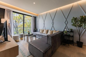 Elegant Apartment with Balcony and City Views